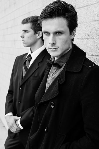 Black and White Portrait of Two Men in Formal Suits