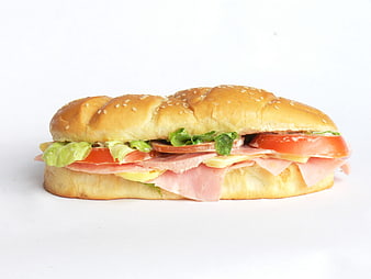 Fresh Ham and Cheese Submarine Sandwich on White Background