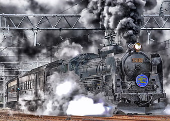 Vintage Steam Locomotive Billowing Smoke on Railroad Tracks