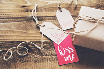 Rustic Gift Box with Valentine's Day Tags on Wood