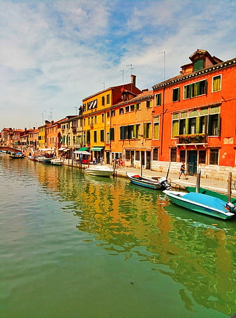 Colorful buildings along a canal in Burano, Italy