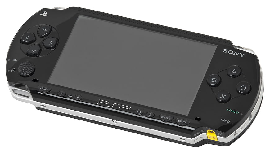 Black Sony PSP Portable Video Game Console On White Background