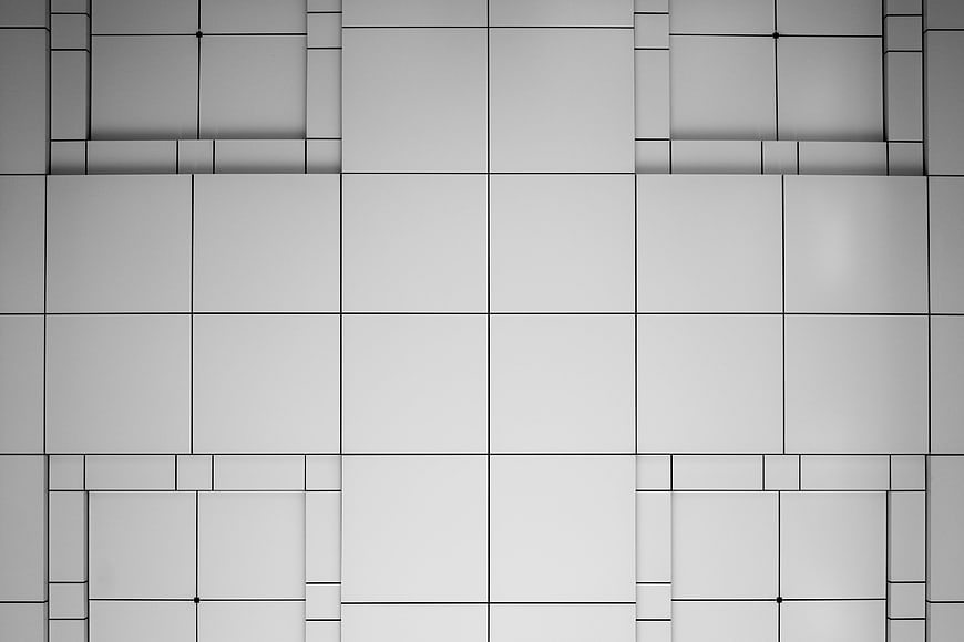 Abstract Geometric Gray Wall Pattern With Square Grid Texture