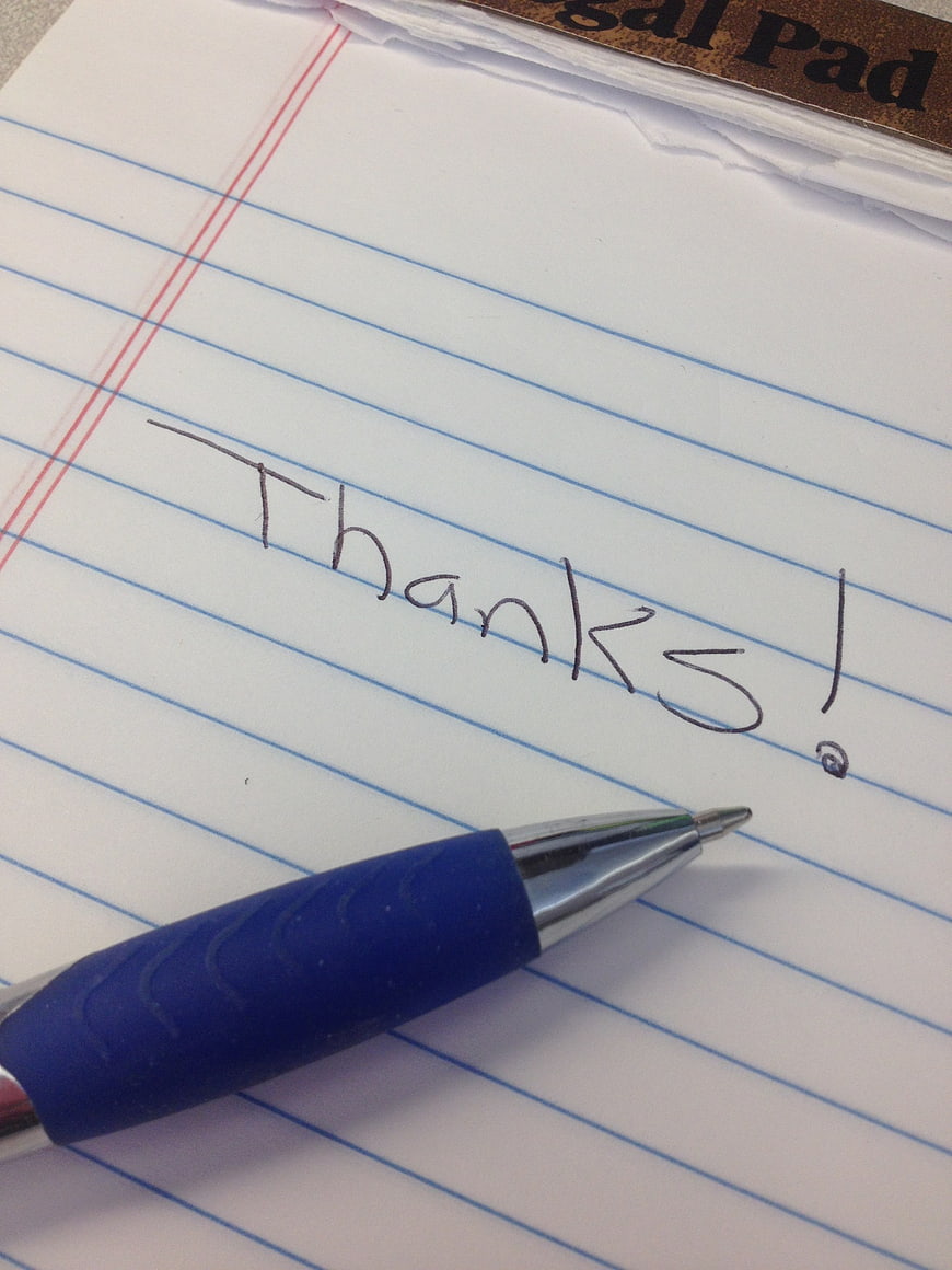 Handwritten Thanks Note on Lined Paper with Blue Pen