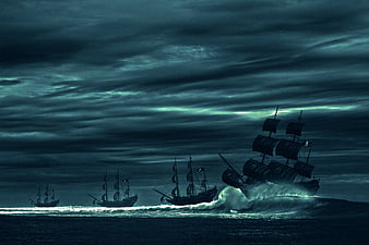 Dramatic Pirate Ships Sailing in Stormy Ocean at Night