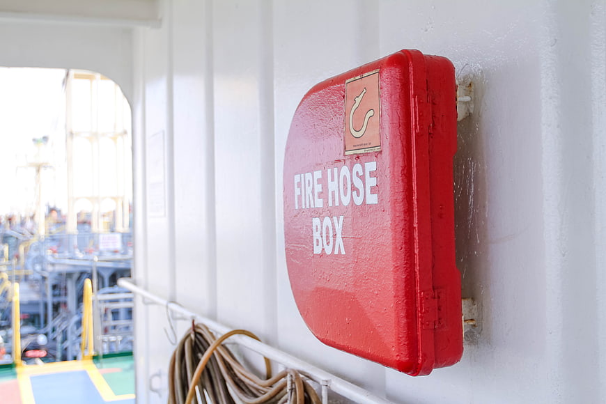 Red Fire Hose Box on Ship Deck