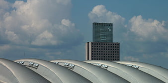 Modern Frankfurt Architecture with Curved Roof and Skyscraper