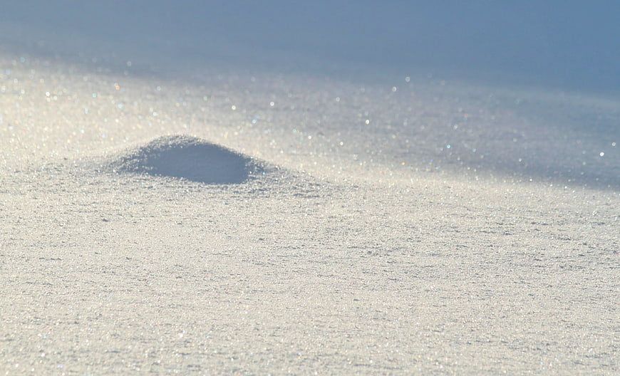 Sparkling Snow Texture with Small Drift and Blue Sky
