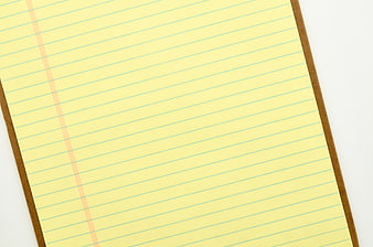 Blank Yellow Lined Paper on Clipboard Background