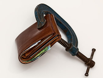 Blue C-Clamp Squeezing Brown Leather Wallet with Cash