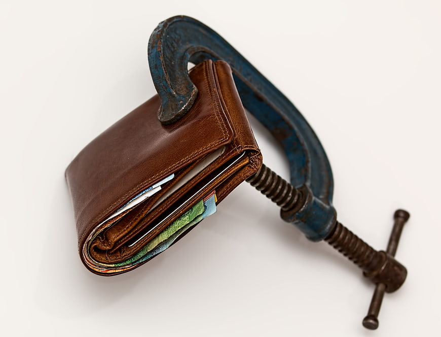 Blue C-Clamp Squeezing Brown Leather Wallet with Cash