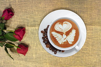 Top View Cappuccino with Heart Latte Art and Red Roses