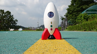 Toy Rocket Ship On Playground Path
