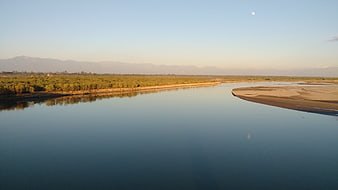 Serene River Landscape with Moon and Mountain Reflection