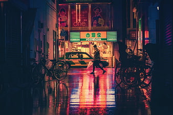 Rainy Night Street Scene in Japan with Neon Reflections