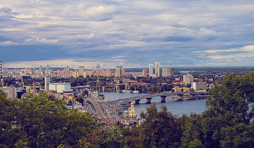 Panoramic View of Kyiv Cityscape with Dnieper River and Bridges