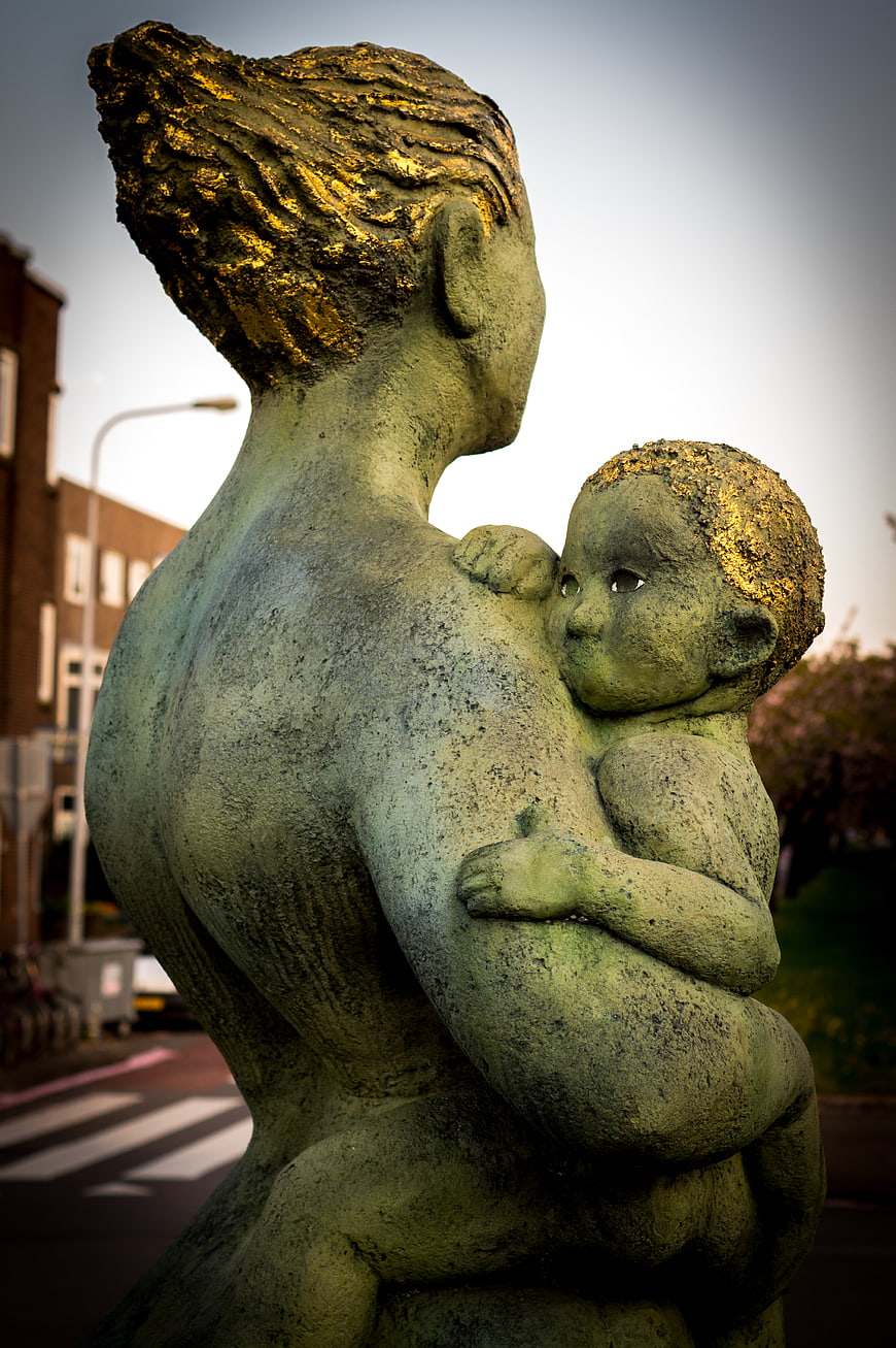 Bronze Statue of Mother and Child with Gold Accents