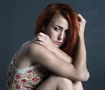 Pensive Redhead Woman in Floral Lace Top Portrait