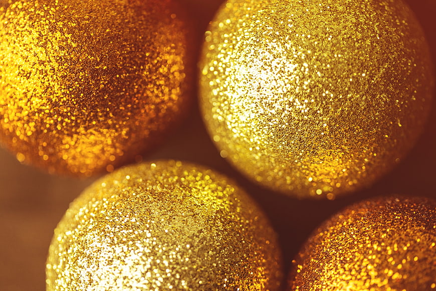 Close-up of Golden Glitter Christmas Ornaments