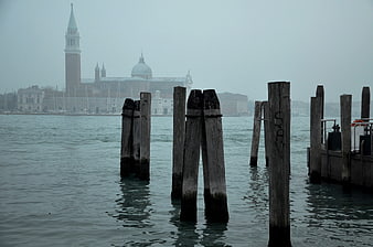 Foggy Venice Lagoon with Wooden Piles and San Giorgio Maggiore