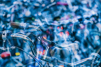 Double Exposure Bicycle Handlebars with Blue Bokeh Background
