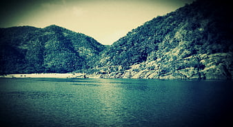 Vintage Teal Landscape of River Valley Between Forested Hills
