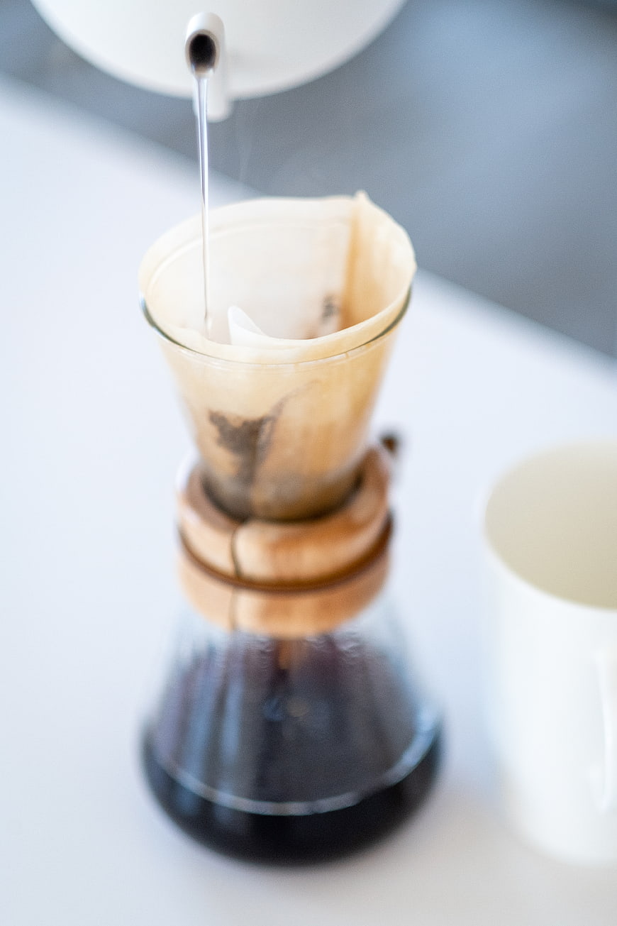 Pour-over coffee brewing process with wooden dripper