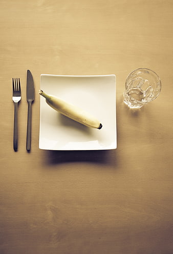 Minimalist Banana Meal Flat Lay on Wooden Table