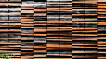 Modern orange and black architectural facade pattern