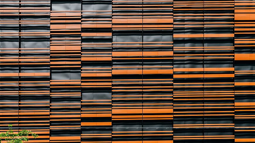 Modern orange and black architectural facade pattern