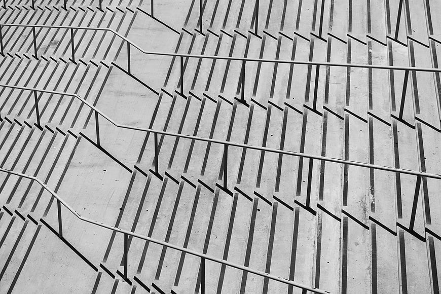 Abstract Black and White Concrete Stairs with Railing Shadows