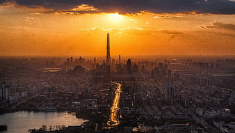 Dramatic Sunset Over Beijing Skyline with CCTV Tower