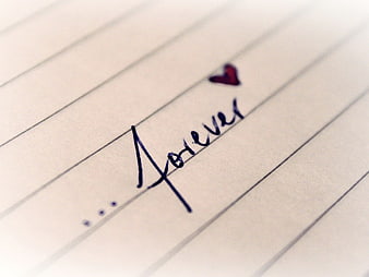 Handwritten word forever with heart on lined paper