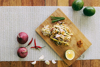Overhead View of Pad Thai Noodles with Fresh Vegetables and Herbs