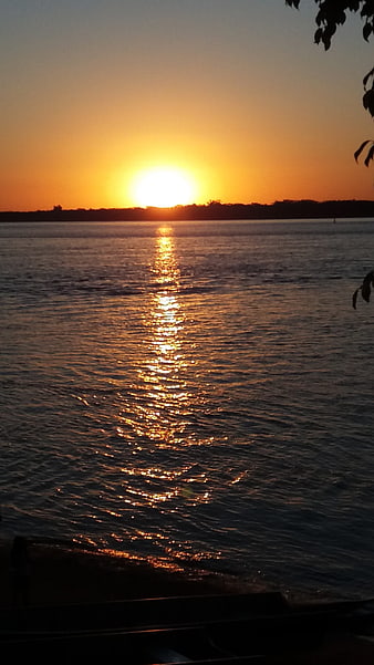 Golden Sunset Over Calm River with Silhouette