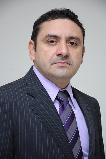 Portrait of a serious businessman in a pinstripe suit
