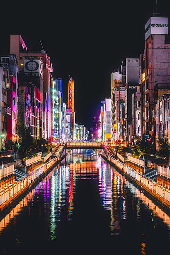 Night view of Dotonbori canal in Osaka, Japan with neon lights
