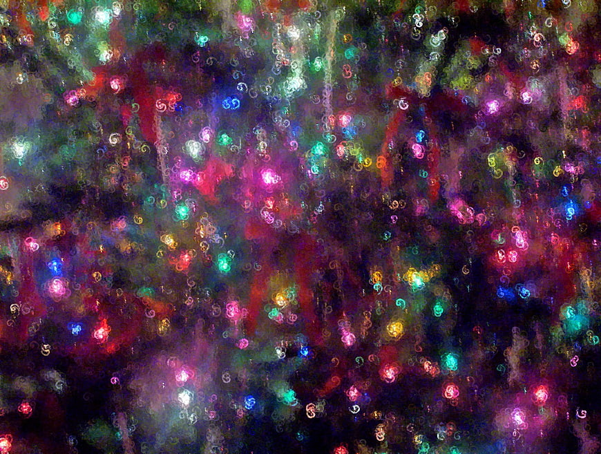 Abstract colorful bokeh lights on dark background