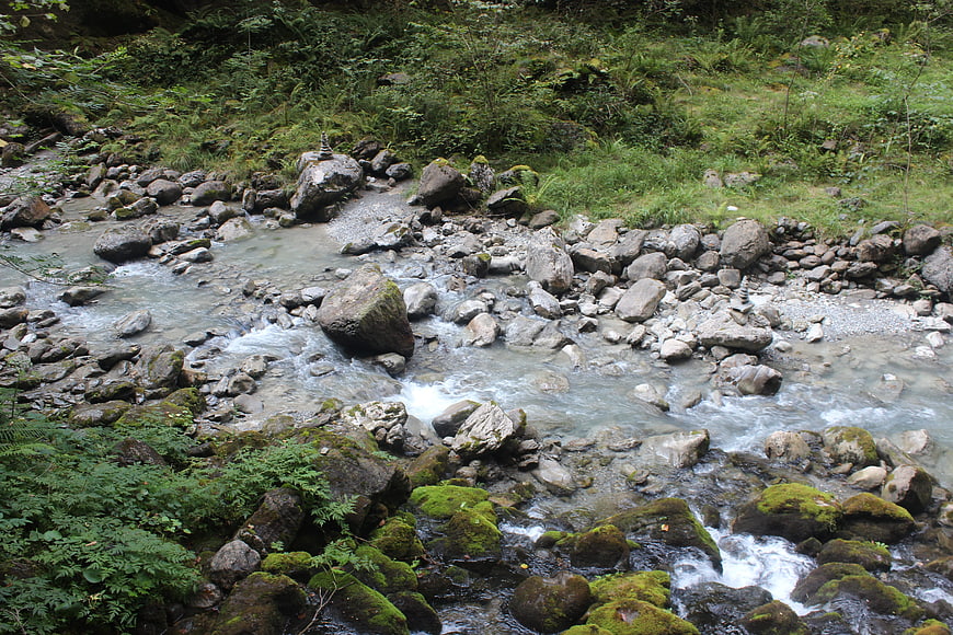 Rock Cairns in a Rocky Mountain Stream