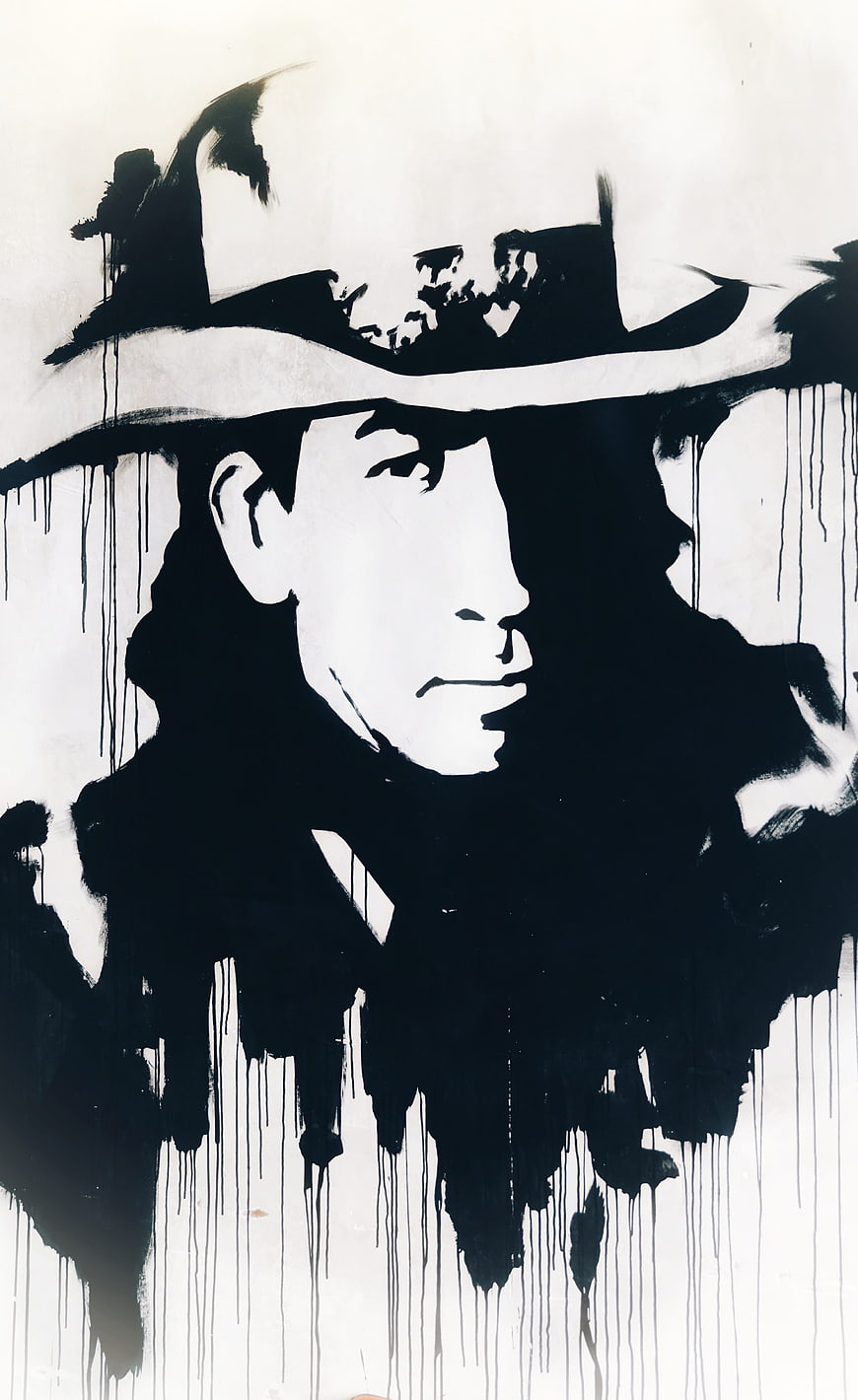 Black and white ink portrait of a man in a cowboy hat