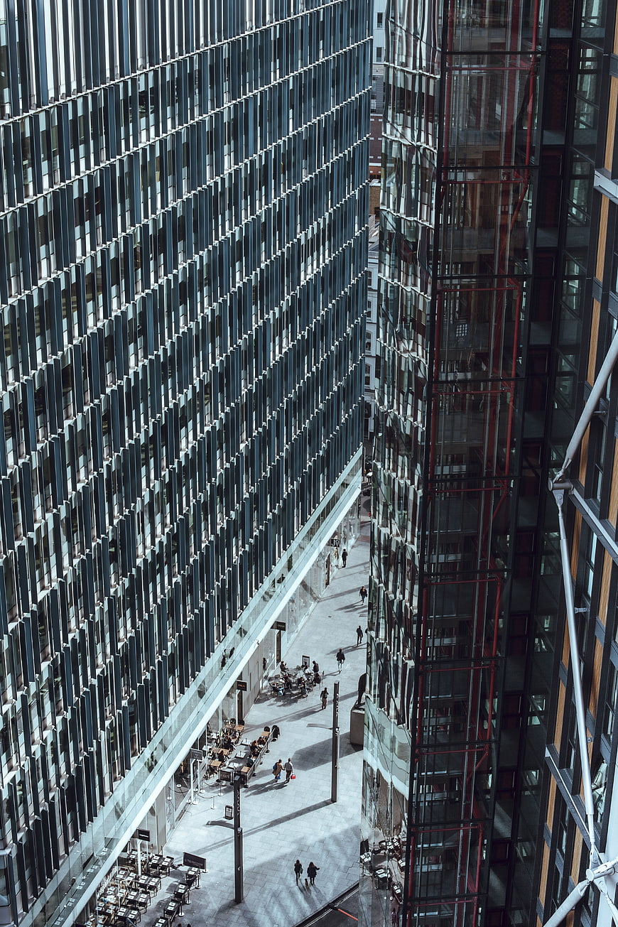 High Angle View of Modern Glass Skyscrapers and Urban Plaza