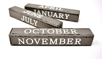 Rustic Wooden Blocks With Month Names On White Background