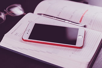 Smartphone on Planner with Pen and Glasses