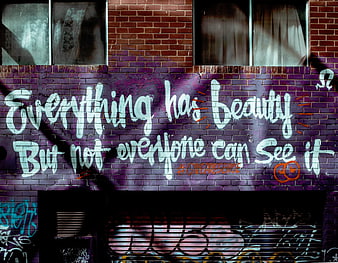 Urban Graffiti Quote On Purple Brick Wall