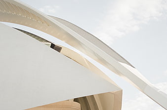 Modern White Curved Architecture Detail Against Sky