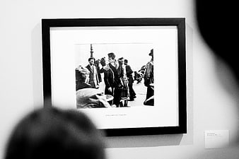 Framed black and white vintage photograph in gallery