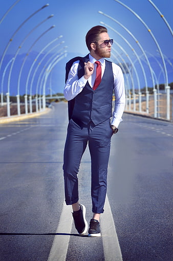Handsome Businessman Walking on Bridge Road