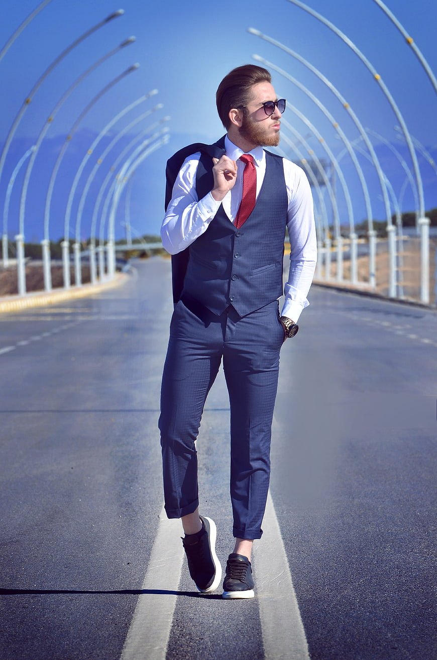Handsome Businessman Walking on Bridge Road