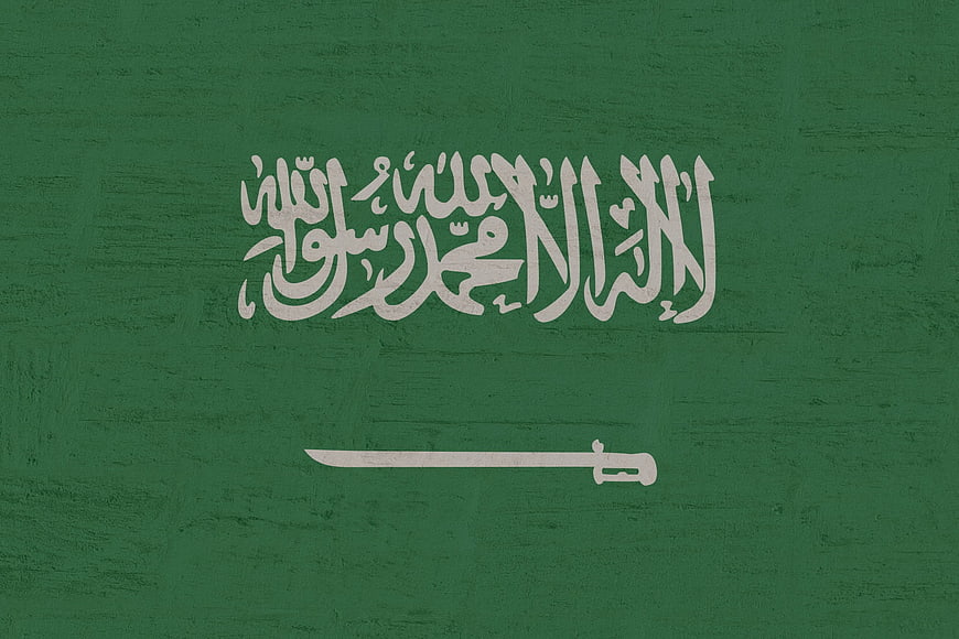 Saudi Arabia Flag on Textured Green Background
