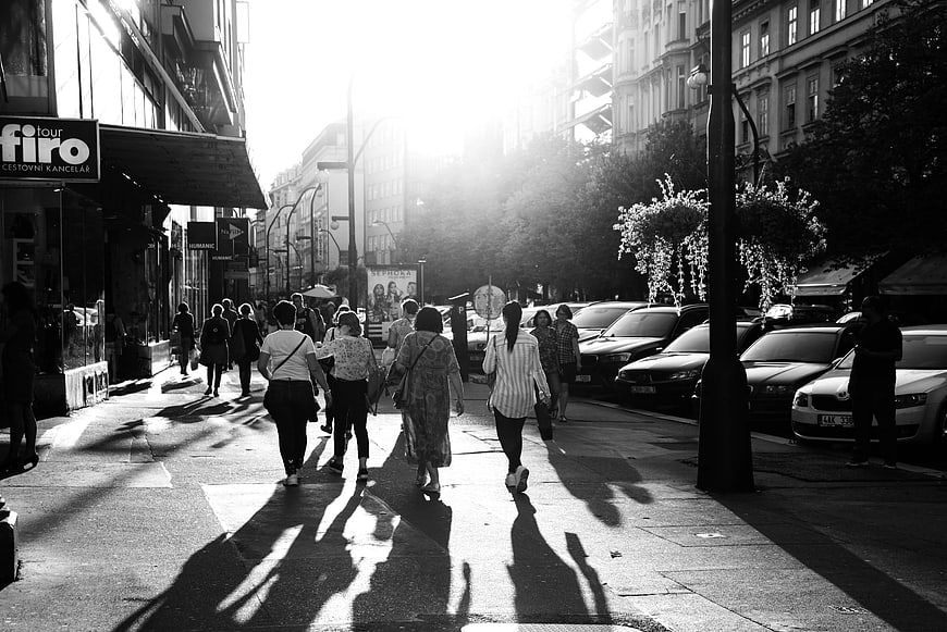 Black and White Street Photography of Pedestrians Walking